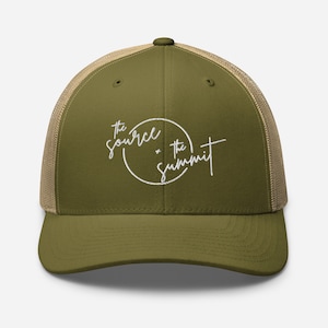 May include: A green and brown trucker hat with a white embroidered logo that says "The Source + The Summit".