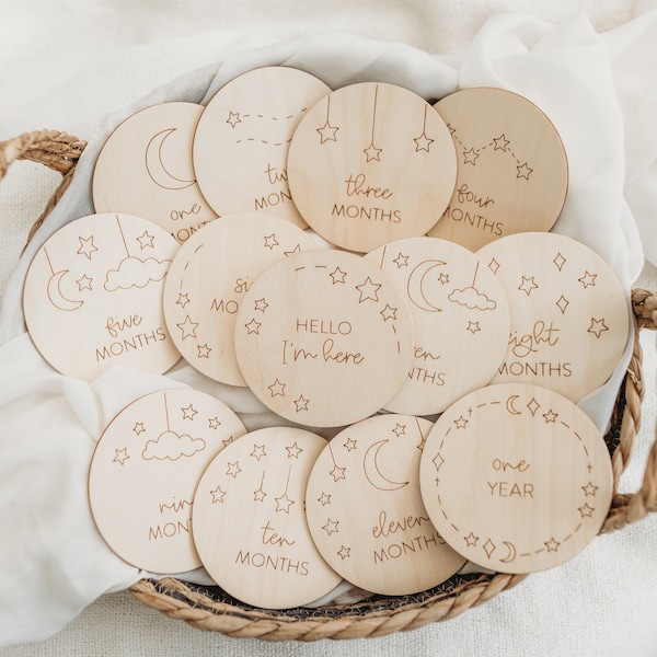 Baby Milestone Discs | Wooden milestone discs, Moon milestones, New baby announcement, Baby shower gift, Baby monthly milestones