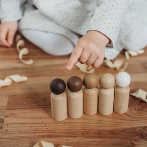 Multicultural Wooden Peg Doll Set | Montessori toys, Peg dolls, Multiracial peg dolls, Inclusive toys, Wooden toys, Montessori toddler