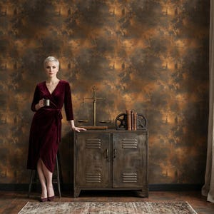May include: A woman in a burgundy wrap dress holds a mug, leaning against a metal cabinet. The cabinet has a scale, books, and gears on top. The background is a textured brown and gold wall.
