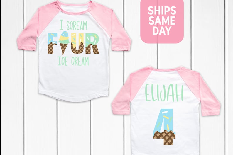 May include: A white and pink baseball tee shirt with the text "I scream for ice cream" and a graphic of an ice cream cone with sprinkles. The back of the shirt has the name "Elijah" and the number "4" with an ice cream cone graphic.