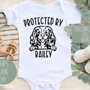 Protected by Dog Onesie®, Personalized Dog Name Baby Onesie®, Cute Personalized Dog Breed  Baby Bodysuit, Custom Dog Name Baby Onesie®