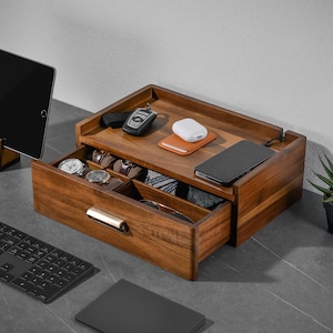 a computer desk with a keyboard and mouse