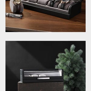 The image is a promotional advertisement for a personalized gift box, featuring a watch and a potted plant on a wooden surface.