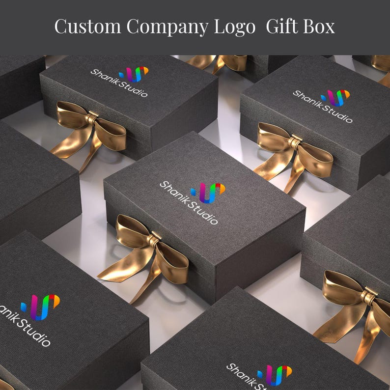a collection of gray gift boxes with gold bows, each featuring the logo of Shank Studio.