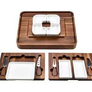 May include: A dark wood serving board with four square white ceramic bowls, accompanied by two additional wooden trays containing two rectangular white ceramic dishes, a cheese fork, and three distinct stainless steel cheese knives.