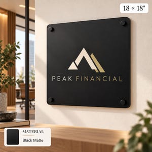 a black sign with the text "PEAK FINANCIAL" displayed prominently.