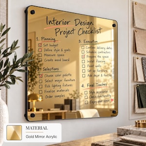 May include: A rectangular gold mirror acrylic board featuring the printed text Interior Design Project Checklist with four numbered sections and checkboxes. The board is mounted with four black circular standoffs at the corners.