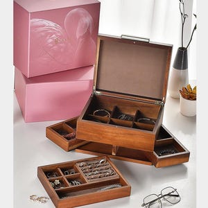 a pink box with a pair of glasses in it