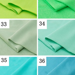 May include: Six fabric swatches in different shades of green and blue. The swatches are numbered 31 through 36.