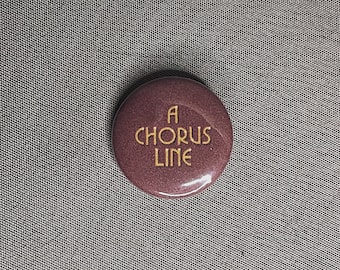 Un botón de retroceso de Chorus Line