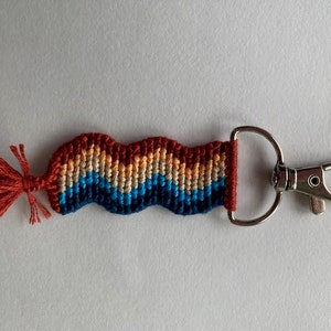 handmade wavy alpha keychain // handmade wavy shaped alpha waves retro unisex knot knotted knots embroidery floss thread keychain