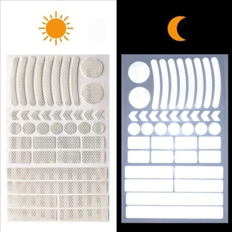 May include: A sheet of white reflective stickers for bicycles. The stickers are in various shapes, including circles, arrows, and rectangles. The stickers are designed to be visible in both daylight and nighttime.