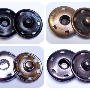 May include: Two sets of metal snap fasteners, each set includes a socket and a stud. The sets are in four different finishes: black, copper, silver, and antique brass.