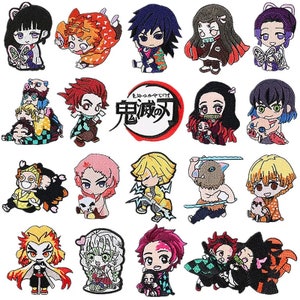 May include: A set of 19 colorful embroidered iron-on patches featuring characters from the anime series "Demon Slayer: Kimetsu no Yaiba". The patches feature various characters, including Tanjiro Kamado, Nezuko Kamado, Zenitsu Agatsuma, Inosuke Hashibira, and Giyu Tomioka. The patches are all approximately 2-3 inches in size.