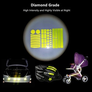 May include: A set of yellow reflective stickers for bikes, helmets, and pushchairs. The stickers are designed to increase visibility at night. The text "Diamond Grade" and "High Intensity and Highly Visible at Night" is displayed above the stickers.
