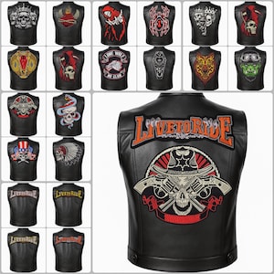 May include: A collection of black leather vests with various embroidered patches. Designs include skulls, snakes, wolves, and patriotic themes. One vest features the text "LIVE TO RIDE" with a skull and crossed revolvers.