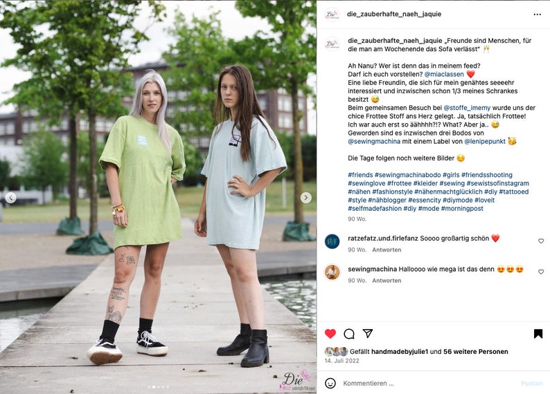 May include: Two people are standing on a sidewalk wearing light green and light blue oversized t-shirts. The t-shirts have a small graphic design on the front. The text "die_zauberhafte_naeh_jaquie" is visible in the upper right corner of the image. The text "Freunde sind Menschen, f&uuml;r die man am Wochenende das Sofa verl&auml;sst" is visible in the upper right corner of the image. The text "Ah Nanu? Wer ist denn das in meinem feed?" is visible in the upper right corner of the image. The text "Darf ich euch vorstellen? @miaclassen" is visible in the upper right corner of the image. The text "Eine liebe Freundin, die sich f&uuml;r mein gen&auml;htes seeeehr interessiert und inzwischen schon 1/3 meines Schrankes besitzt" is visible in the upper right corner of the image. The text "Beim gemeinsamen Besuch bei @stoffe_imemy wurde uns der chice Frottee Stoff ans Herz gelegt. Ja, tats&auml;chlich Frottee!" is visible in the upper right corner of the image. The text "Ich war auch erst so &auml;&auml;hhhh?!? What? Aber ja.." is visible in the upper right corner of the image. The text "Geworden sind es inzwischen drei Bodos von @sewingmachina mit einem Label von @lenipepunkt" is visible in the upper right corner of the image. The text "Die Tage folgen noch weitere Bilder" is visible in the upper right corner of the image. The text "#friends #sewingmachinabodo #girls #friendsshooting #sewinglove #frottee #kleider #sewing #sewistsofinstagram #n&auml;hen #fashionstyle #n&auml;henmachtgl&uuml;cklich #diy #tattooed #style #n&auml;hblogger #essencity #diymode #loveit #selfmadefashion #diy #mode #morningpost" is visible in the upper right corner of the image. The text "ratzefatz.und.filefanz Soooo gro&szlig;artig schon" is visible in the upper right corner of the image. The text "sewingmachina Halloooo wie mega ist das denn" is visible in the upper right corner of the image.