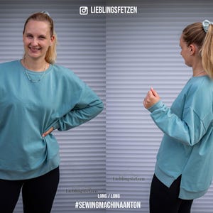May include: A teal blue oversized sweatshirt with long sleeves and a side slit. The sweatshirt is shown on a model with the text "Lieblingsfetzen" and "#SEWINGMACHINAANTON" on the bottom.