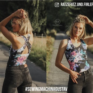 May include: A black tank top with a floral pattern in pink, purple, and blue. The tank top has a criss-cross back design. The text "#SEWINGMACHINAGUSTAV" is visible at the bottom of the image. The Instagram handle "RATZEFATZ.UND.FIRLEFANZ" is at the top.