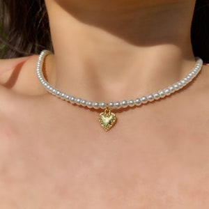 Pearl necklace with heart charm