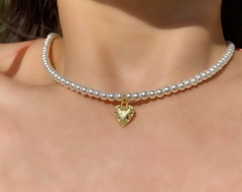 Pearl necklace with heart charm