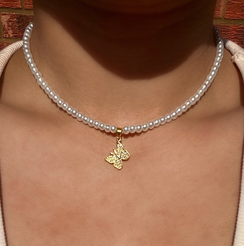 Dainty pearl necklace with butterfly charm image 1