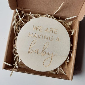 We Are Having A Baby Wooden Disc | Pregnancy Baby Announcement Sign / Photo Prop | Newborn Baby Gift | Laser Engraved Wooden Gift 1st Baby