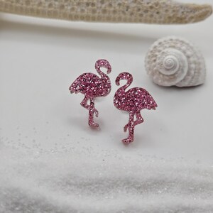 Two pink glitter flamingo stud earrings