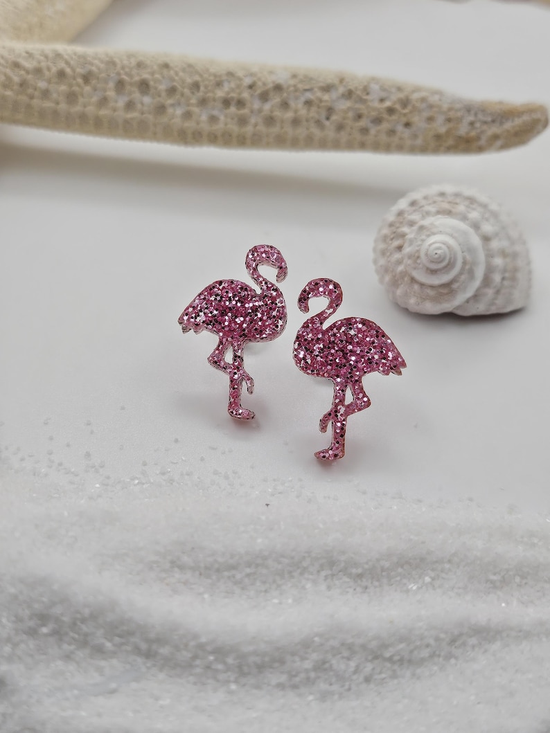 Two pink glitter flamingo stud earrings