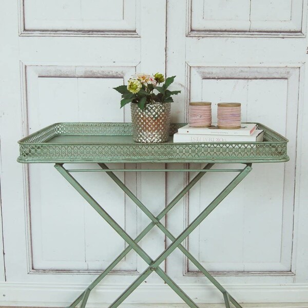 Enchanting side table in shabby chic style with a green vintage patina