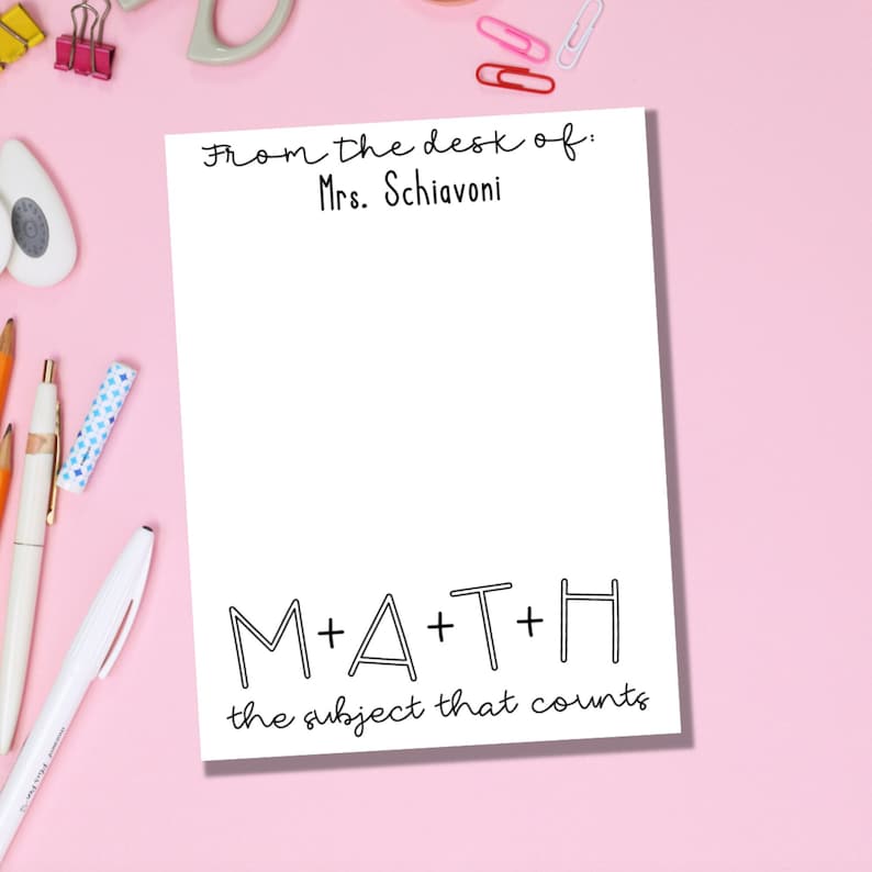 May include: White note pad with black text that says "From the desk of: Mrs. Schiavoni" at the top and "M+A+T+H the subject that counts" at the bottom.