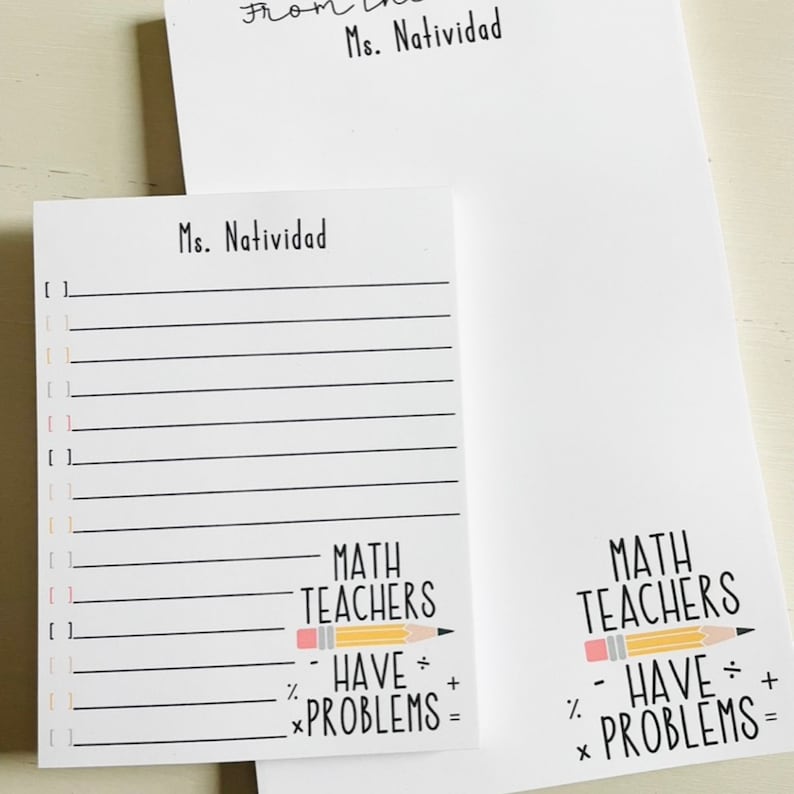 May include: A white notepad with black lines and the text "Ms. Natividad" at the top. The bottom of the notepad has a pencil drawing with the text "MATH TEACHERS HAVE PROBLEMS =" in black text.