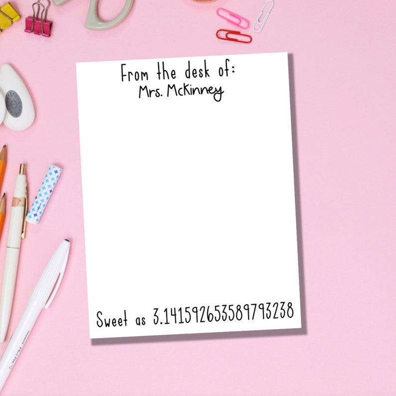 May include: White notepad with the text "From the desk of: Mrs. McKinney" at the top and "Sweet as 3.141592653589793238" at the bottom.