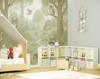May include: A child's bedroom featuring a light wood house-shaped bed, a white corner storage unit with cubbies, and a forest-themed wallpaper with illustrations of an owl, deer, raccoon, and wolf. A heart-shaped mobile hangs on the wall.