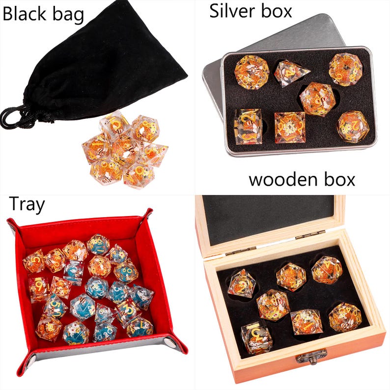 May include: A set of polyhedral dice with gold and orange accents, shown in a black velvet bag, a silver box, a wooden box, and a red felt tray. The dice are clear and have a variety of shapes.