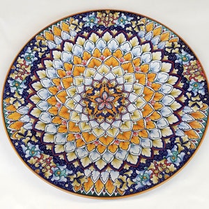 Majolic wall plate in full Renaissance design.