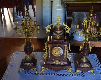 An Impressive 19th Century French Rouge Marble Clock and Garnitures