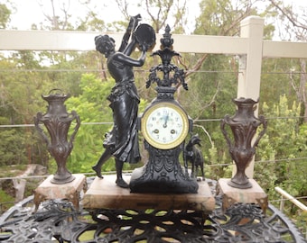 A Bronze and Marble French Antique Clock Title "Esmerelda" and Garnitures