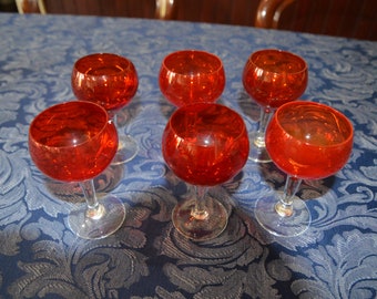 A Set of Six Red Glass Liquor Goblets
