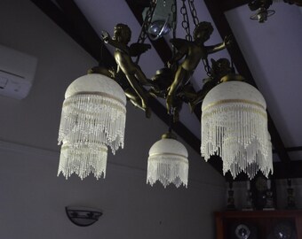 A Vintage Brass and Glass Shade Angelic Form Chandelier