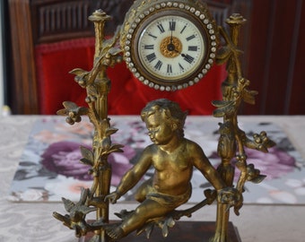 A 19th Century French Brass Cherub Clock
