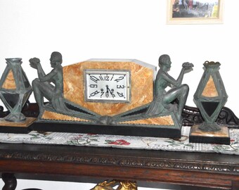 A French Bronze and Marble Art Deco Era Mantle Clock and Garnitures