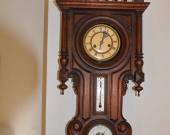 An Antique French Henri II Carved Oak Weather Station