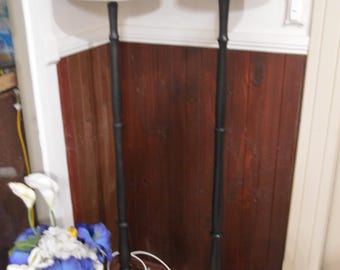 A Pair of Matched Black Painted Coachwood Standard lamps