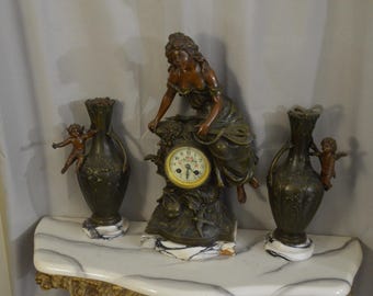 An L & F Moreau "Mignon" Bronze and Marble Clock and Garniture Set