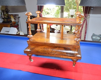 A Late Victorian Walnut Music Canterbury with Carved Finials and Concealed Frieze Drawer