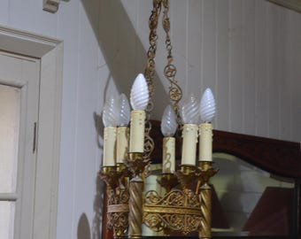 An Ornate French Brass Chandelier