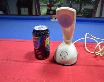 A 1960's Ivory Cobra Form Ericofon Telephone