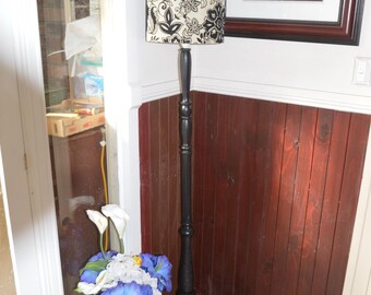 A Turned Pine Painted Standard Lamp with Foliate Stem